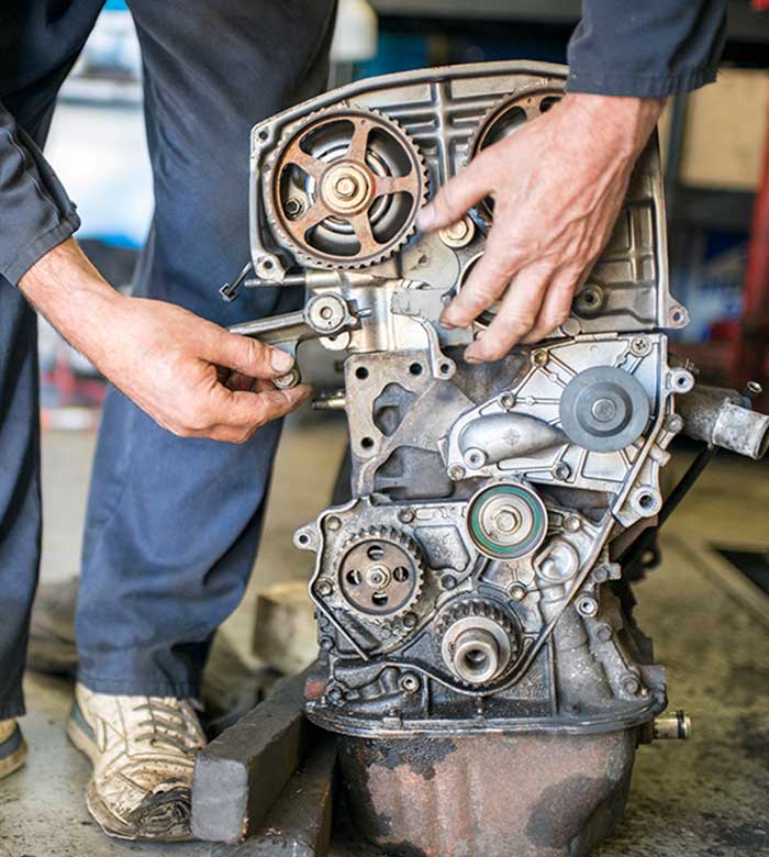 A Mechanic Repairing Engine
