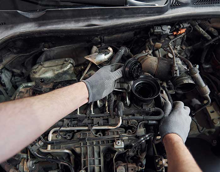 Mechanic Repairing a Car